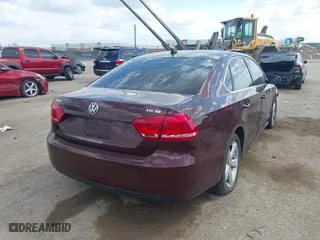 2013 Volkswagen Passat TDI SE w/Sunroof with VIN 1VWBN7A38DC010949, listed as a IAAI auction lot 41902605 with 223,435 mi miles. Bid and sale history available at carsss.com. Image 4.