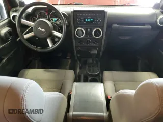 2008 Jeep Wrangler Unlimited Sahara z VIN 1J4GA59198L570409, wystawiony jako Copart lot #58853295 z przebiegiem 84 502 mil mil oraz Nie do naprawy • Non repairable. Historia ofert i sprzedaży dostępna na DreamBid. Obrazek 8.