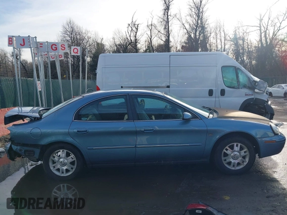 2005 Mercury Sable LS with VIN 1MEFM55S65A611575, listed as a IAAI auction lot 41535836 with 98,932 mi miles and . Bid and sale history available at carsss.com. Image 14.
