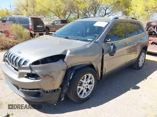 2017 Jeep Cherokee Latitude with VIN 1C4PJLCB8HW667384, listed as a IAAI auction lot 42047427 with 103,339 mi miles and . Bid and sale history available at carsss.com. Image 2.