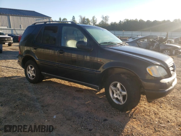 1999 Mercedes-Benz M-Class with VIN 4JGAB54E0XA118194, listed as a Copart auction lot 75242784 with 284,187 mi miles and Salvage Title. Bid and sale history available at carsss.com. Image 4.