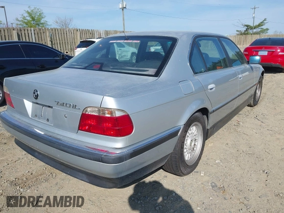 1998 BMW 7 Series 740il with VIN WBAGJ8324WDM11469, listed as a IAAI auction lot 42069641 with 1 mi miles. Bid and sale history available at carsss.com. Image 4.