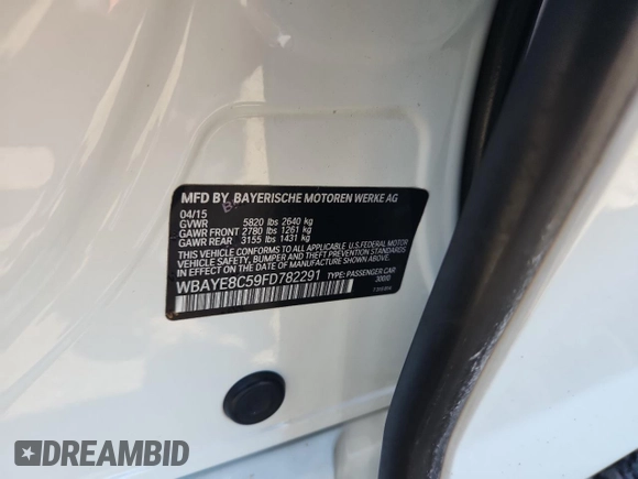 2015 BMW 7 Series 750Li with VIN WBAYE8C59FD782291, listed as a Copart auction lot 65119745 with 159,479 mi miles and Salvage title. Bid and sale history available at DreamBid. Image 12.