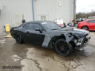2013 Dodge Challenger R/T with VIN 2C3CDYBT9DH558815, listed as a Copart auction lot 47601315 with 124,098 mi miles and Salvage Title. Bid and sale history available at carsss.com. Image 4.