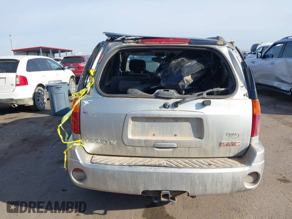2004 GMC Envoy SLT with VIN 1GKDT13S742133932, listed as a IAAI auction lot 41598339 with 168,651 mi miles and . Bid and sale history available at DreamBid. Image 16.