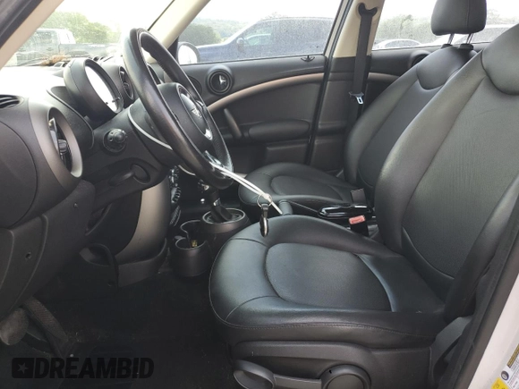 2012 MINI Countryman with VIN WMWZB3C56CWM04896, listed as a Copart auction lot 63803045 with 96,443 mi miles and Clean title. Bid and sale history available at DreamBid. Image 7.