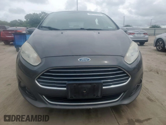 2015 Ford Fiesta Titanium z VIN 3FADP4FJ5FM203174, wystawiony jako Copart lot #60727515 z przebiegiem 91 898 mil mil oraz Czysty tytuł • Clean title. Historia ofert i sprzedaży dostępna na DreamBid. Obrazek 5.