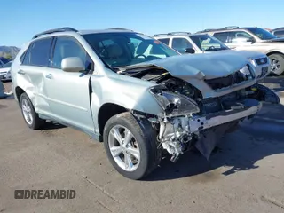 2008 Lexus RX 400h with VIN JTJHW31U782044935, listed as a IAAI auction lot 41824263 with 74,360 mi miles and . Bid and sale history available at DreamBid. Image 1.