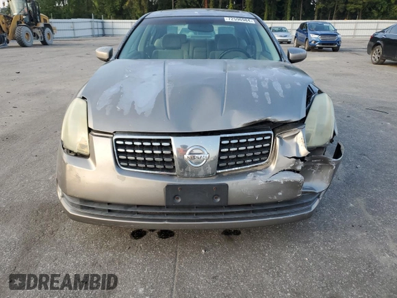 2004 Nissan Maxima SE with VIN 1N4BA41E24C878448, listed as a Copart auction lot 72596984 with 329,525 mi miles and Salvage Title. Bid and sale history available at carsss.com. Image 5.