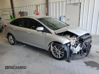 2018 Ford Focus SE z VIN 1FADP3FE9JL234158, wystawiony jako Copart lot #51788755 z przebiegiem 99 877 mil mil oraz Szkoda całkowita • Salvage title. Historia ofert i sprzedaży dostępna na DreamBid. Obrazek 4.