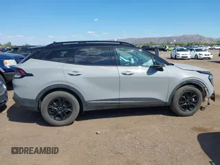 2023 Kia Sportage X-Pro Prestige z VIN 5XYK7CAF7PG091605, wystawiony jako IAAI lot #42414577 z przebiegiem 43 120 mil mil oraz . Historia ofert i sprzedaży dostępna na DreamBid. Obrazek 13.