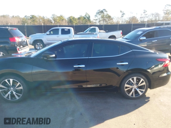 2016 Nissan Maxima SV with VIN 1N4AA6AP0GC385090, listed as a IAAI auction lot 41215857 with 97,072 mi miles and . Bid and sale history available at DreamBid. Image 14.