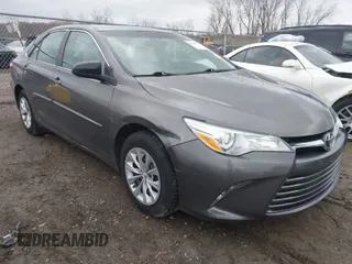2015 Toyota Camry XLE with VIN 4T4BF1FK7FR450768, listed as a IAAI auction lot 41963191 with 126,571 mi miles. Bid and sale history available at carsss.com. Image 1.