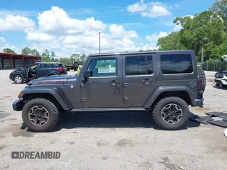 2017 Jeep Wrangler Unlimited Rubicon Recon with VIN 1C4HJWFG2HL560846, listed as a IAAI auction lot 42532745 with 101,285 mi miles and . Bid and sale history available at DreamBid. Image 14.