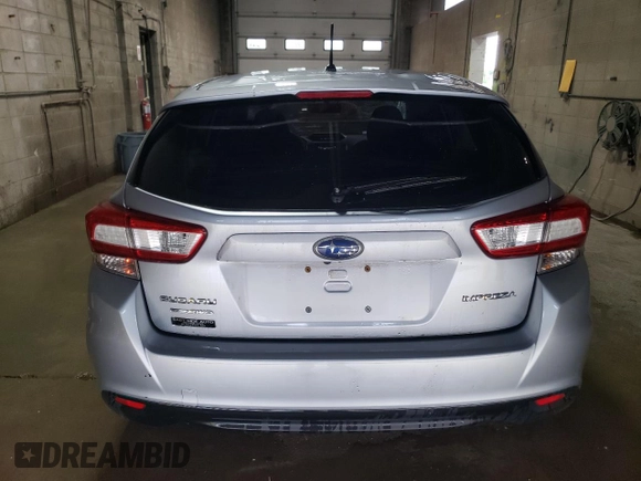2018 Subaru Impreza с VIN 4S3GTAA61J3714928, выставлен на аукционе Copart как лот 59552555 с пробегом 59 125 миль миль и Списание • Salvage title. История ставок и продаж доступна на DreamBid. Изображение 6.