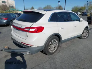 2016 Lincoln MKX Select with VIN 2LMTJ6KR5GBL30010, listed as a IAAI auction lot 41741385 with 112,647 mi miles. Bid and sale history available at carsss.com. Image 4.