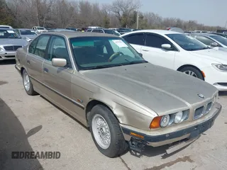 1995 BMW 5 Series 525i z VIN WBAHD6325SGK57508, wystawiony jako IAAI lot #41755962 z przebiegiem 275 362 mil mil oraz . Historia ofert i sprzedaży dostępna na DreamBid. Obrazek 1.
