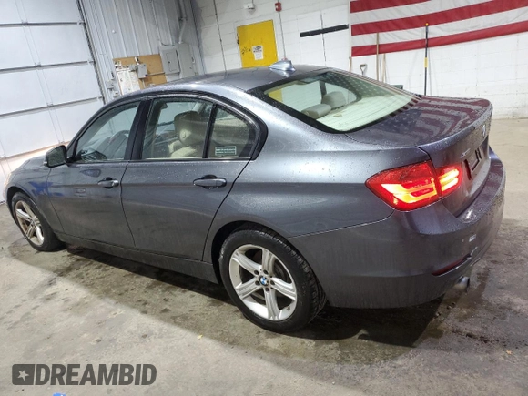 2015 BMW 3 Series 320i xDrive with VIN WBA3C3C52FP664472, listed as a Copart auction lot 55647585 with 129,934 mi miles and Salvage title. Bid and sale history available at DreamBid. Image 2.