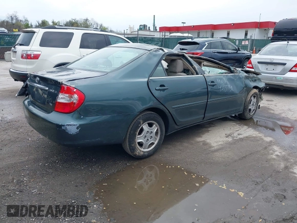 2002 Toyota Camry XLE z VIN 4T1BF32K02U522335, wystawiony jako IAAI lot #42037459 z przebiegiem 214 832 mil mil oraz . Historia ofert i sprzedaży dostępna na DreamBid. Obrazek 4.