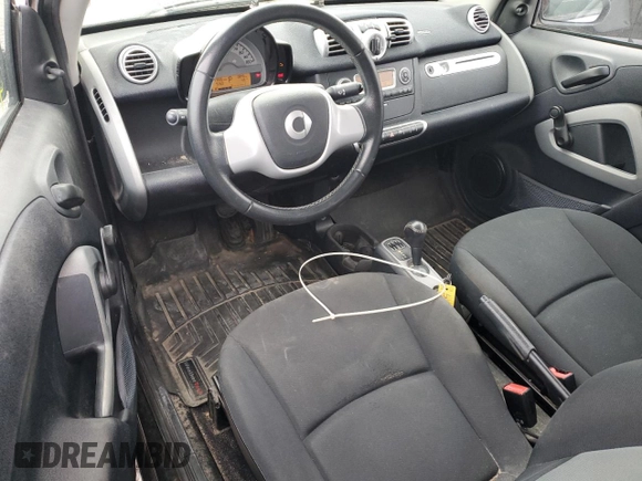 2012 Smart fortwo Pure z VIN WMEEJ3BA1CK559092, wystawiony jako Copart lot #85506924 z przebiegiem 47 806 mil mil oraz Szkoda całkowita • Salvage title. Historia ofert i sprzedaży dostępna na DreamBid. Obrazek 8.
