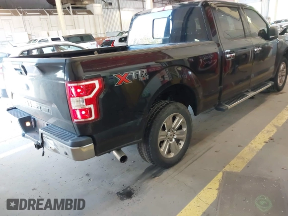 2018 Ford F-150 XL with VIN 1FTFW1E53JKC00430, listed as a IAAI auction lot 42086555 with 67,761 mi miles and . Bid and sale history available at DreamBid. Image 4.
