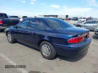 2001 Buick Century Custom with VIN 2G4WS52J711164323, listed as a IAAI auction lot 42120475 with 94,560 mi miles. Bid and sale history available at carsss.com. Image 3.