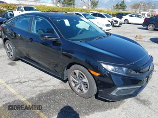 2020 Honda Civic LX z VIN 19XFC2F6XLE212683, wystawiony jako IAAI lot #41745743 z przebiegiem 81 553 mil mil oraz . Historia ofert i sprzedaży dostępna na DreamBid. Obrazek 1.