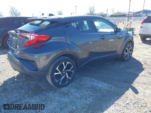 2018 Toyota C-HR XLE z VIN NMTKHMBX5JR042941, wystawiony jako IAAI lot #41803153 z przebiegiem 110 220 mil mil oraz . Historia ofert i sprzedaży dostępna na DreamBid. Obrazek 4.