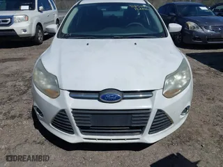 2012 Ford Focus SE with VIN 1FAHP3K25CL122733, listed as a IAAI auction lot 41836880 with 125,439 mi miles. Bid and sale history available at carsss.com. Image 6.
