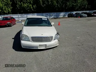 2005 Cadillac DeVille z VIN 1G6KD54Y65U100231, wystawiony jako Copart lot #55758605 z przebiegiem 166 871 mil mil oraz Szkoda całkowita • Salvage title. Historia ofert i sprzedaży dostępna na DreamBid. Obrazek 14.