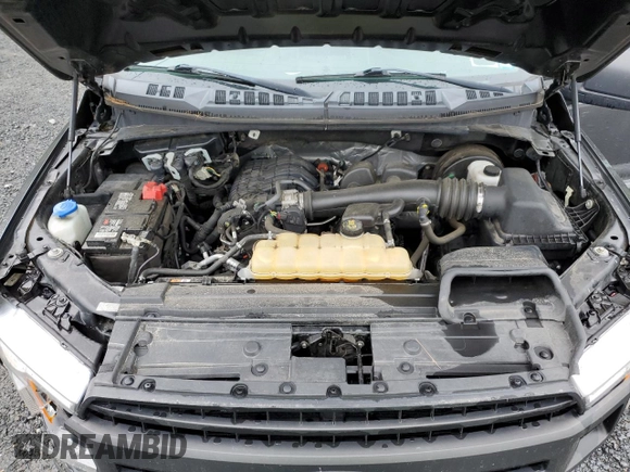 2019 Ford F-150 XL z VIN 1FTMF1CB6KKC82803, wystawiony jako Copart lot #60141195 z przebiegiem 92 414 mil mil oraz Szkoda całkowita • Salvage title. Historia ofert i sprzedaży dostępna na DreamBid. Obrazek 11.