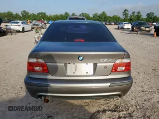 2003 BMW 5 Series 540i z VIN WBADN63473GN88833, wystawiony jako Copart lot #61287275 z przebiegiem 133 101 mil mil oraz Czysty tytuł • Clean title. Historia ofert i sprzedaży dostępna na DreamBid. Obrazek 6.