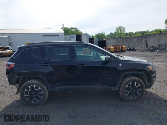 2020 Jeep Compass Trailhawk z VIN 3C4NJDDB7LT195317, wystawiony jako IAAI lot #42325122 z przebiegiem 97 858 mil mil oraz . Historia ofert i sprzedaży dostępna na DreamBid. Obrazek 13.