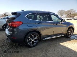 2016 BMW X1 xDrive28i with VIN WBXHT3C35G5E52949, listed as a Copart auction lot 48480215 with 100,228 mi miles and Clean Title. Bid and sale history available at carsss.com. Image 3.