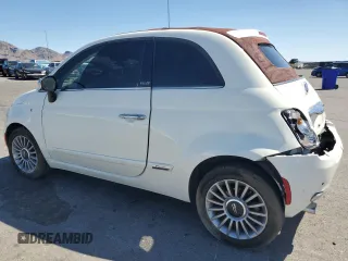 2012 FIAT 500 Lounge z VIN 3C3CFFERXCT370485, wystawiony jako Copart lot #57119785 z przebiegiem 108 721 mil mil oraz Szkody całkowita. Historia ofert i sprzedaży dostępna na DreamBid. Obrazek 2.