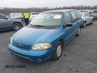 2003 Ford Windstar with VIN 2FMZA50453BB56263, listed as a IAAI auction lot 41619271 with 90,954 mi miles and . Bid and sale history available at carsss.com. Image 2.