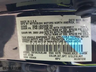 2011 Mitsubishi Endeavor LS with VIN 4A4JN2AS0BE026338, listed as a IAAI auction lot 41703458 with 140,986 mi miles. Bid and sale history available at carsss.com. Image 9.