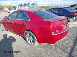 2008 Cadillac CTS RWD w/1SB with VIN 1G6DR57V580212574, listed as a IAAI auction lot 42010537 with 122,390 mi miles. Bid and sale history available at carsss.com. Image 3.