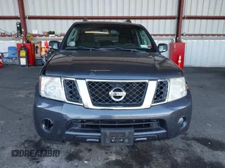 2011 Nissan Pathfinder LE z VIN 5N1AR1NB1BC616913, wystawiony jako IAAI lot #40627326 z przebiegiem 119 372 mil mil oraz . Historia ofert i sprzedaży dostępna na DreamBid. Obrazek 12.