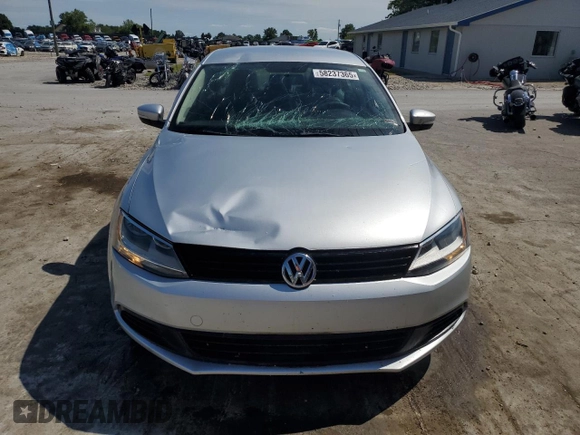 2012 Volkswagen Jetta TDI w/Premium & Nav z VIN 3VWLL7AJ9CM069918, wystawiony jako Copart lot #58237365 z przebiegiem 107 890 mil mil oraz Szkoda całkowita • Salvage title. Historia ofert i sprzedaży dostępna na DreamBid. Obrazek 5.
