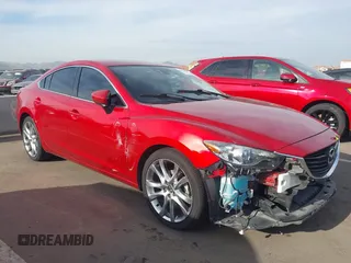 2014 Mazda 6 i Grand Touring with VIN JM1GJ1W69E1129496, listed as a IAAI auction lot 41892071 with 94,050 mi miles. Bid and sale history available at carsss.com. Image 1.
