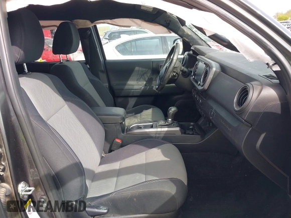 2020 Toyota Tacoma SR5 with VIN 3TMCZ5AN7LM321061, listed as a IAAI auction lot 41985533 with 32,111 mi miles and . Bid and sale history available at DreamBid. Image 5.