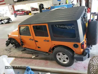 2013 Jeep Wrangler Unlimited Sport with VIN 1C4BJWDG7DL557119, listed as a Copart auction lot 63186715 with 86,241 mi miles and Salvage title. Bid and sale history available at DreamBid. Image 2.