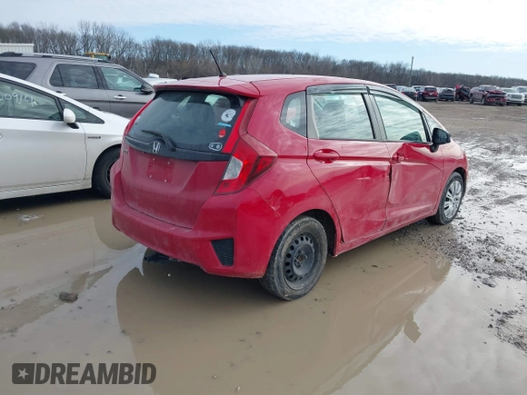 2015 Honda Fit LX z VIN 3HGGK5H54FM728448, wystawiony jako IAAI lot #41538650 z przebiegiem 115 450 mil mil oraz . Historia ofert i sprzedaży dostępna na DreamBid. Obrazek 4.
