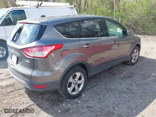 2013 Ford Escape SE with VIN 1FMCU9GX5DUD72758, listed as a IAAI auction lot 41983665 with 282,604 mi miles. Bid and sale history available at carsss.com. Image 4.