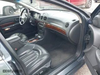 2001 Chrysler LHS with VIN 2C3HC56G01H562025, listed as a IAAI auction lot 40875197 with 282,882 mi miles. Bid and sale history available at carsss.com. Image 5.