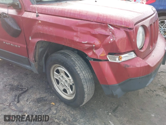 2015 Jeep Patriot Altitude Edition with VIN 1C4NJPBA8FD284559, listed as a IAAI auction lot 41495746 with 165,245 mi miles. Bid and sale history available at carsss.com. Image 6.