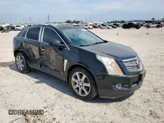 2012 Cadillac SRX Premium Collection z VIN 3GYFNCE39CS526425, wystawiony jako Copart lot #60557615 z przebiegiem 161 217 mil mil oraz Szkoda całkowita • Salvage title. Historia ofert i sprzedaży dostępna na DreamBid. Obrazek 4.
