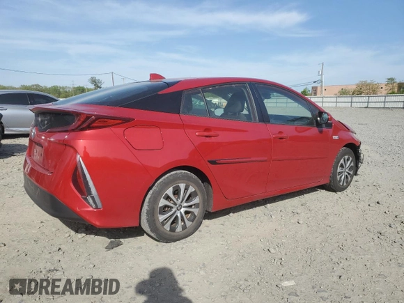 2021 Toyota Prius LE z VIN JTDKAMFP2M3182323, wystawiony jako Copart lot #54396715 z przebiegiem 68 525 mil mil oraz Szkoda całkowita • Salvage title. Historia ofert i sprzedaży dostępna na DreamBid. Obrazek 3.