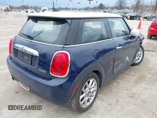 2017 MINI Hardtop Cooper with VIN WMWXP5C34H3B15966, listed as a IAAI auction lot 41889565 with 21,579 mi miles and . Bid and sale history available at DreamBid. Image 4.